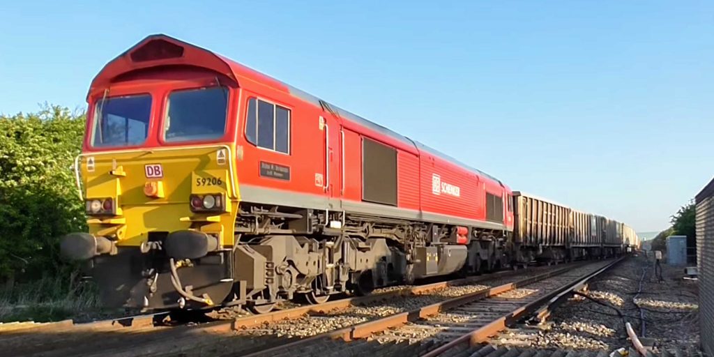 DB Cargo Class 59 number 59206 hauls a rake of JNA and JYA box wagons